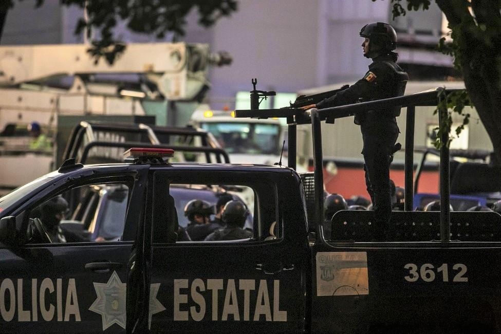 Con cua El Chapo bi bat, thanh pho Mexico bien thanh 'chien truong' hinh anh