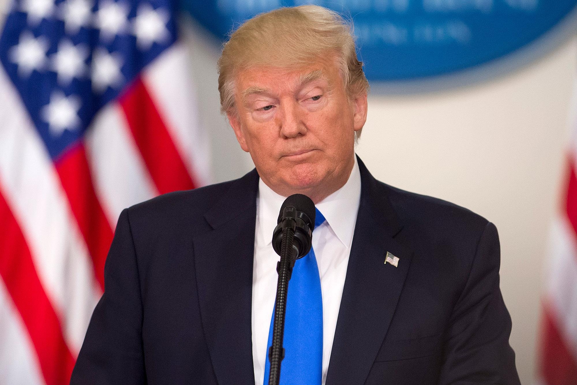 Toa buoc TT Trump tra 2 trieu USD vi dung sai tien tu thien hinh anh