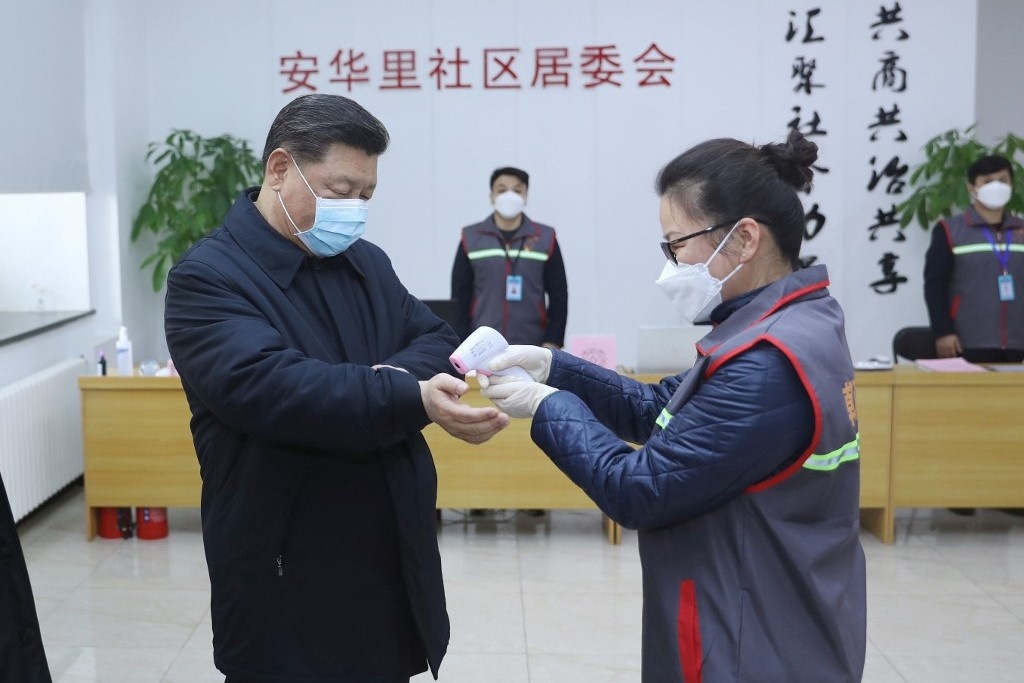 Bac Kinh, Thuong Hai cho 'phong toa mot phan' de ung pho virus corona hinh anh