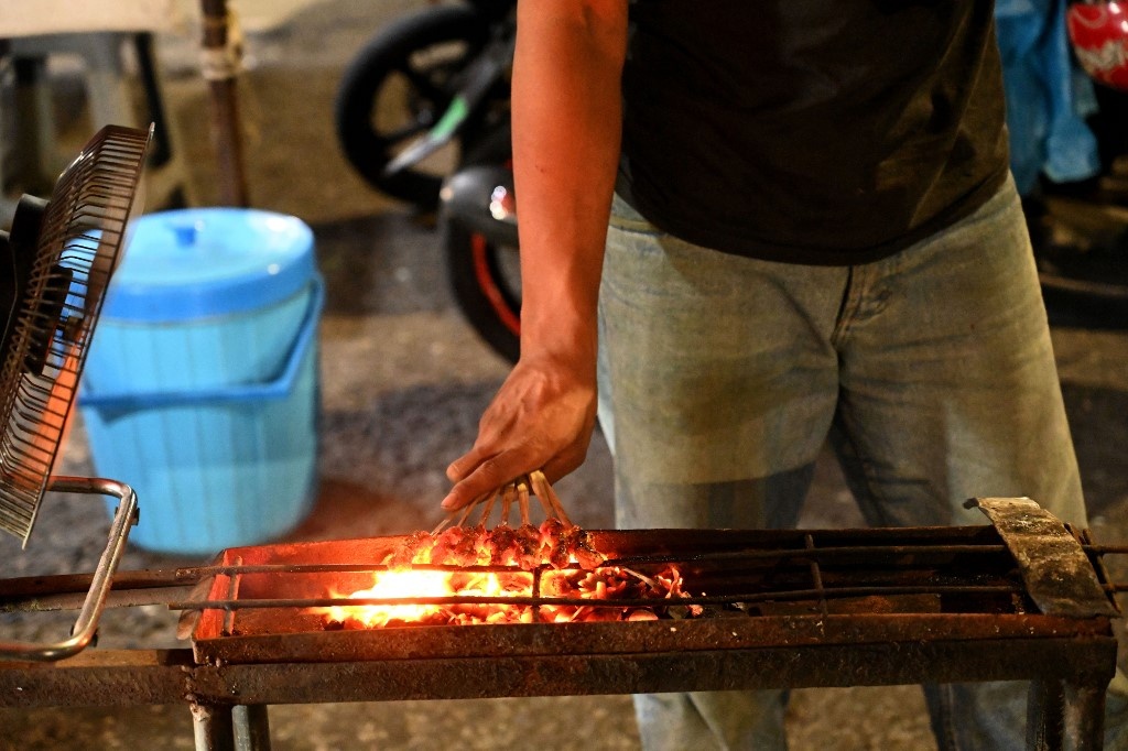 Cho thit rung Indonesia hon nhien ban doi anh 9