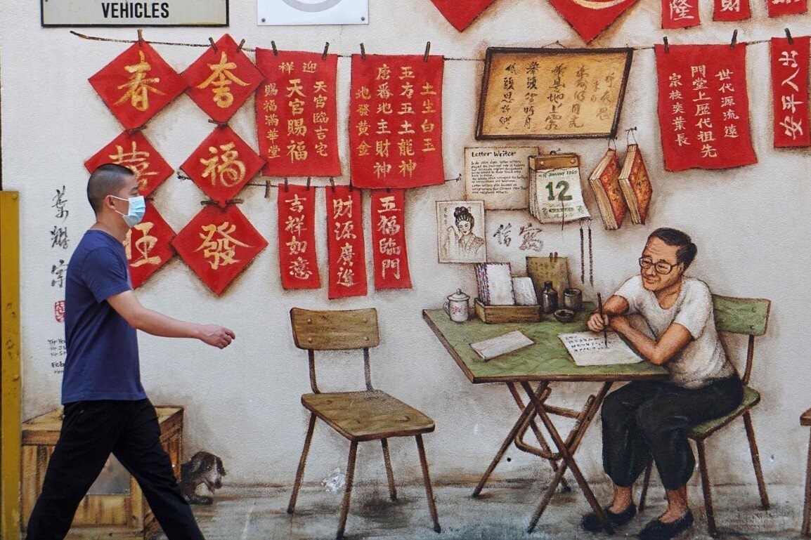 Ly do Singapore dot ngot doi lap truong, khuyen dan deo khau trang hinh anh