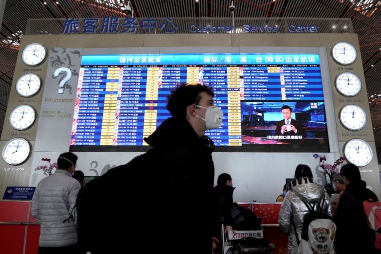 Sau don tra dua tu My, Trung Quoc noi kiem soat hang bay nuoc ngoai hinh anh