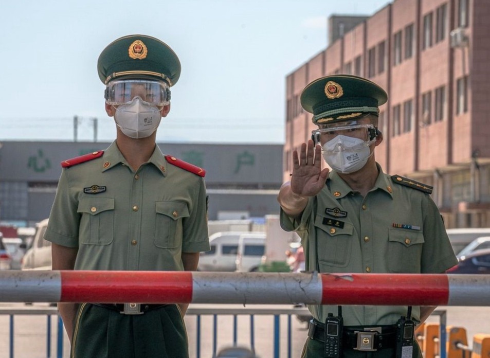 Bac Kinh phong toa them 10 khu vuc vi dich bung phat hinh anh