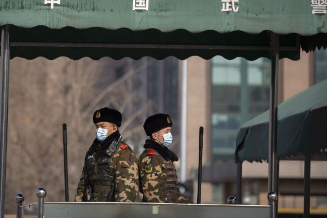 Trung Quoc bat ngo phong toa thu phu Tan Cuong vi Covid-19 bung phat hinh anh