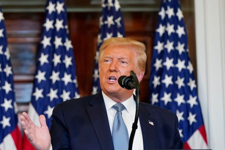 Den du su kien ve quyen phu nu, ong Trump tiep tuc cong kich ba Obama hinh anh