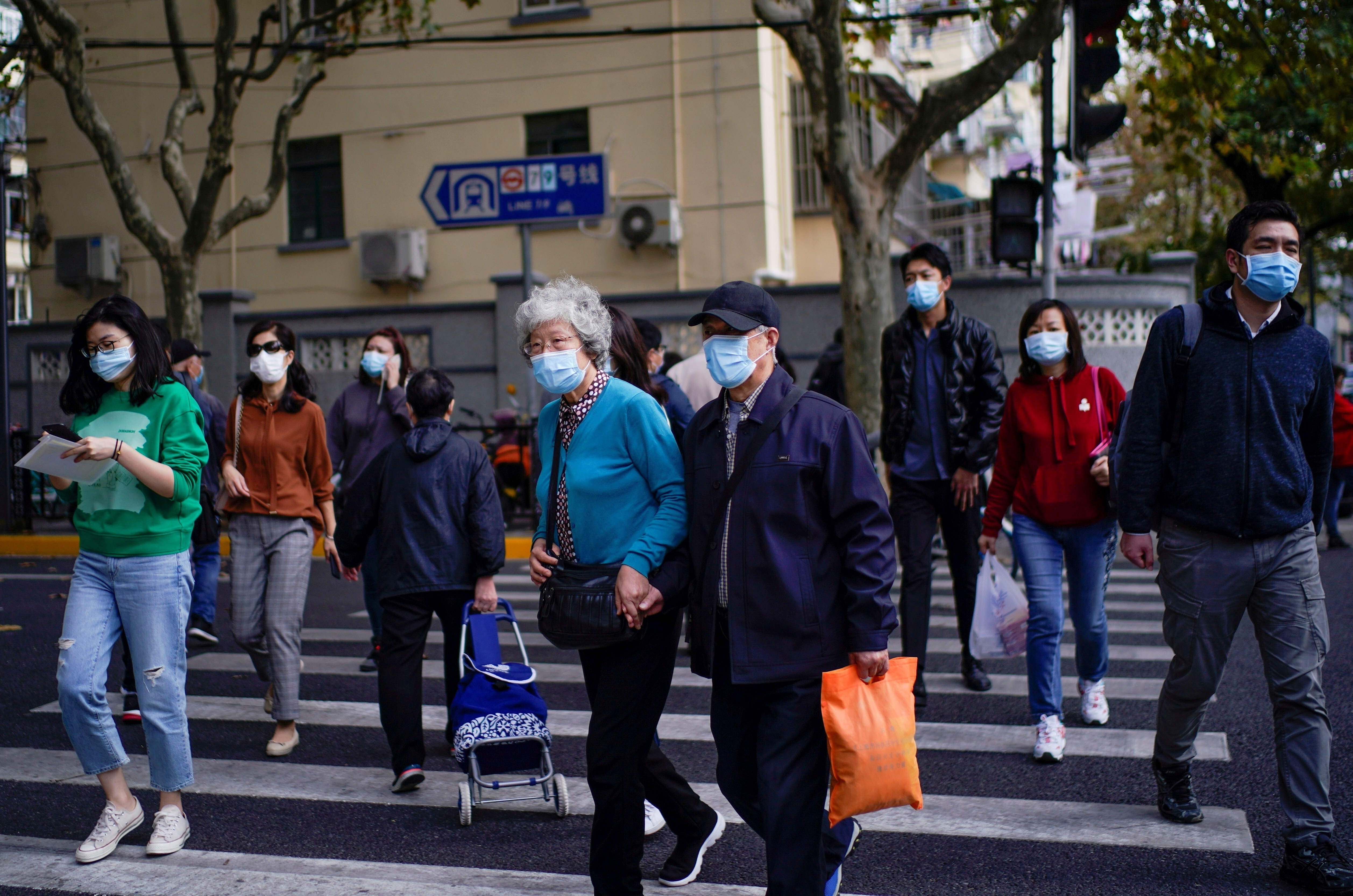 Phat hien ca nhiem moi, 3 trieu dan Trung Quoc di xet nghiem Covid-19 hinh anh