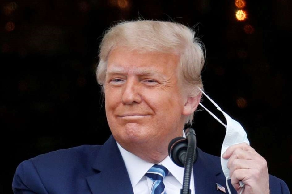 Tong thong Trump hoan ke hoach tiem vaccine Covid-19 trong Nha Trang hinh anh