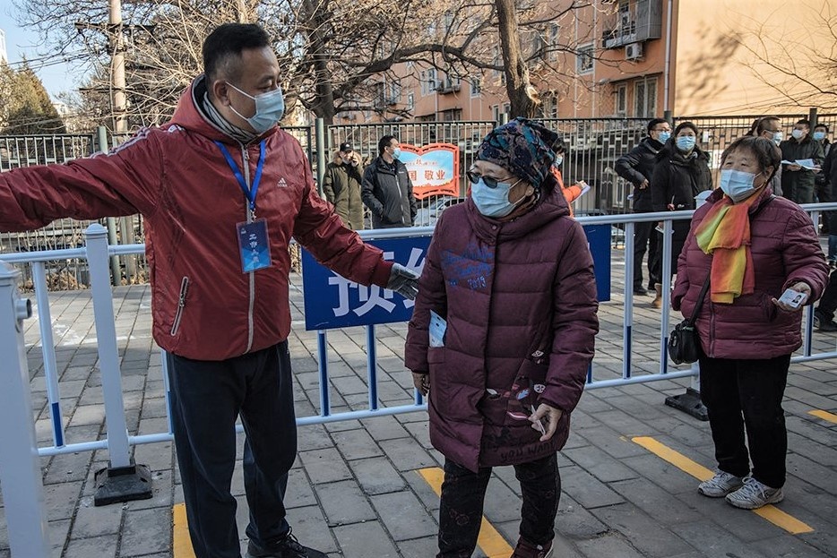 Bac Kinh bao dong voi 13 ca benh Covid-19 khong ro nguon goc hinh anh