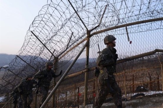 Han Quoc ket an nguoi giet dong nghiep, tim duong tron sang Trieu Tien hinh anh