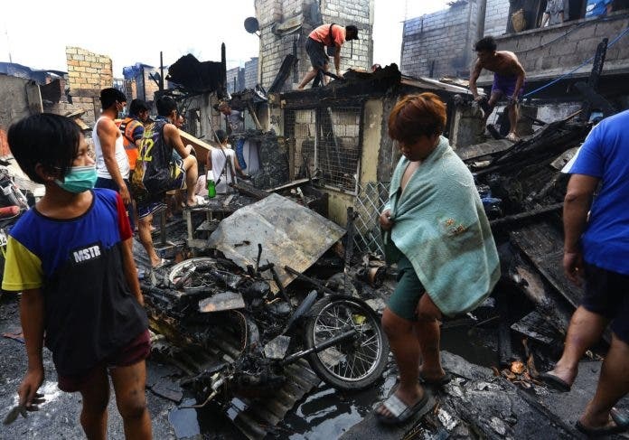 Lua thieu rui khoang 300 ngoi nha o Manila anh 7