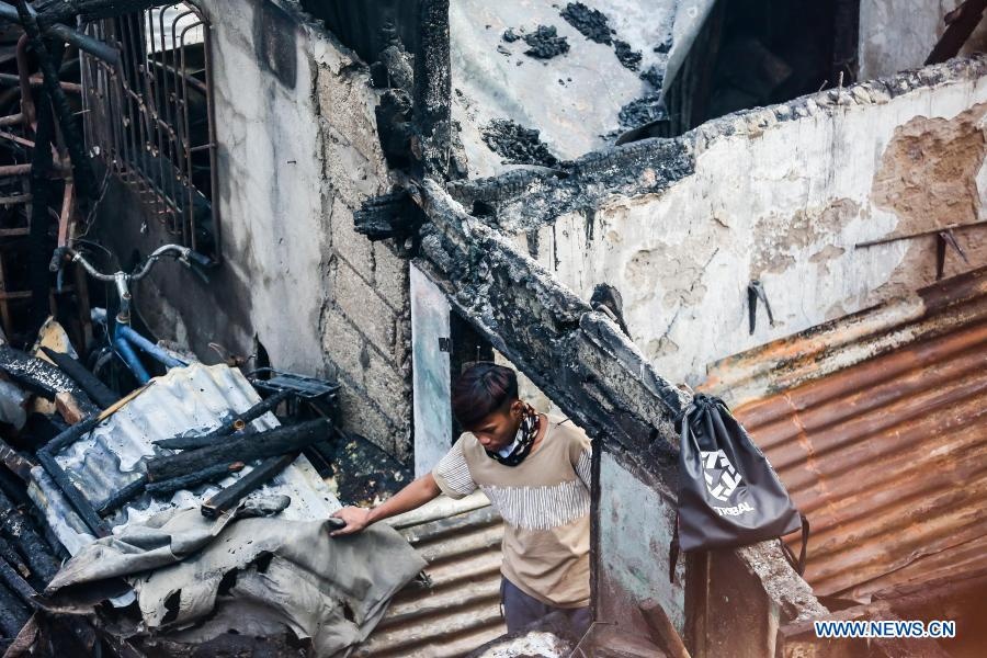 Lua thieu rui khoang 300 ngoi nha o Manila anh 8