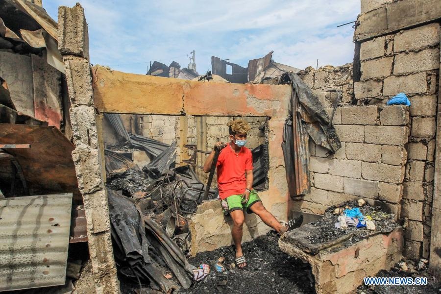 Lua thieu rui khoang 300 ngoi nha o Manila anh 10