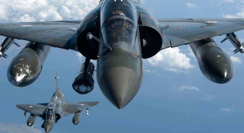 Tra dua IS, Phap doi bom mot loat can cu o Syria hinh anh