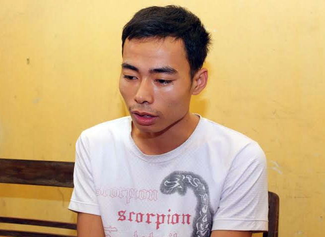 Nguyễn Quang Tiền tại cơ quan điều tra. Ảnh: V.Q.