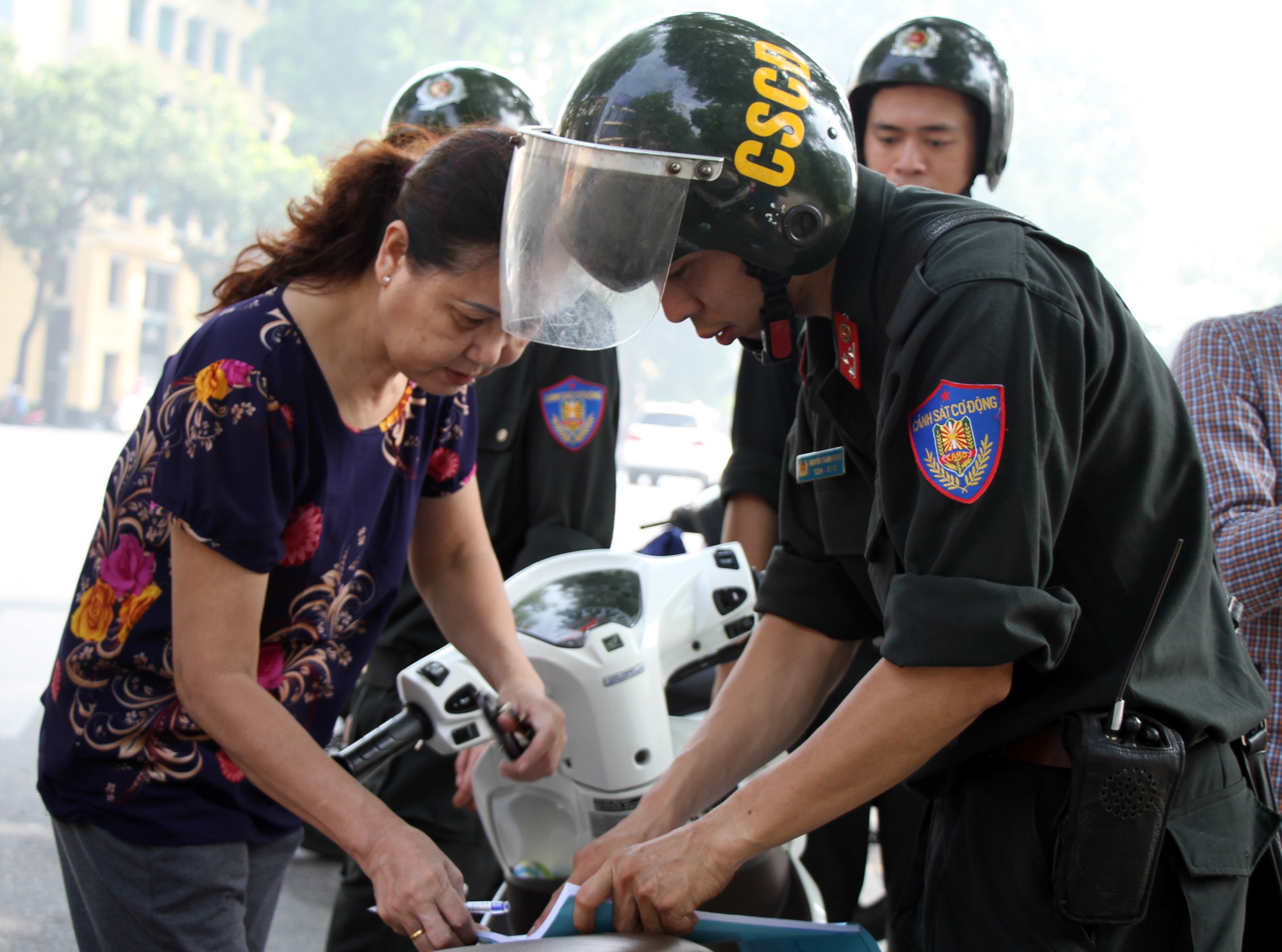 CSCD xu phat khong doi mu bao hiem anh 3
