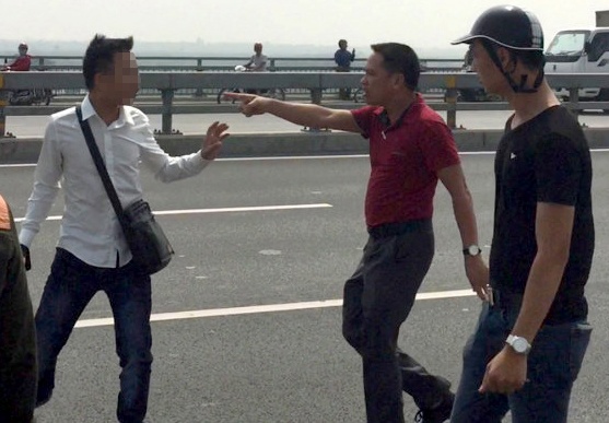 Chu tich Ha Noi yeu cau xu ly vu cong an danh phong vien hinh anh