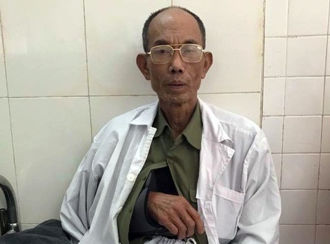 Thuong binh bi danh chieu 28 Tet gui don den canh sat hinh anh