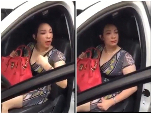 'Kieu nu Hai Duong' lai oto chay nguoc chieu bi hat nuoc vao mat hinh anh