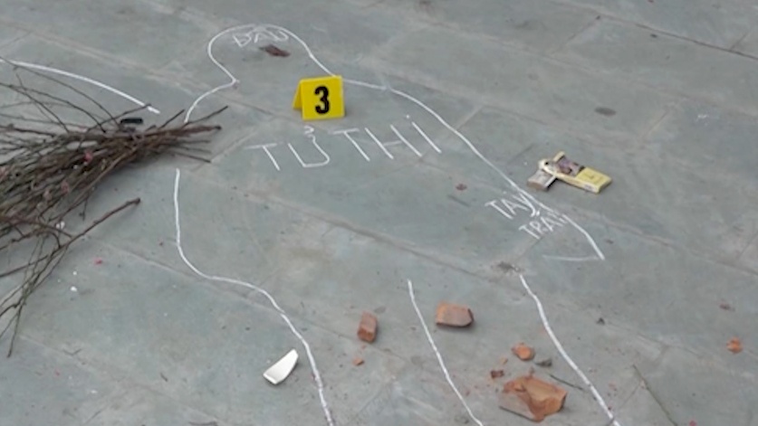 Hai thanh nien danh chet nguoi trom tai san giua pho hinh anh