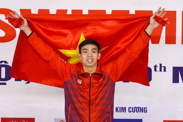 Kinh ngu Huy Hoang - nha vo dich SEA Games voi ganh nang tren vai hinh anh