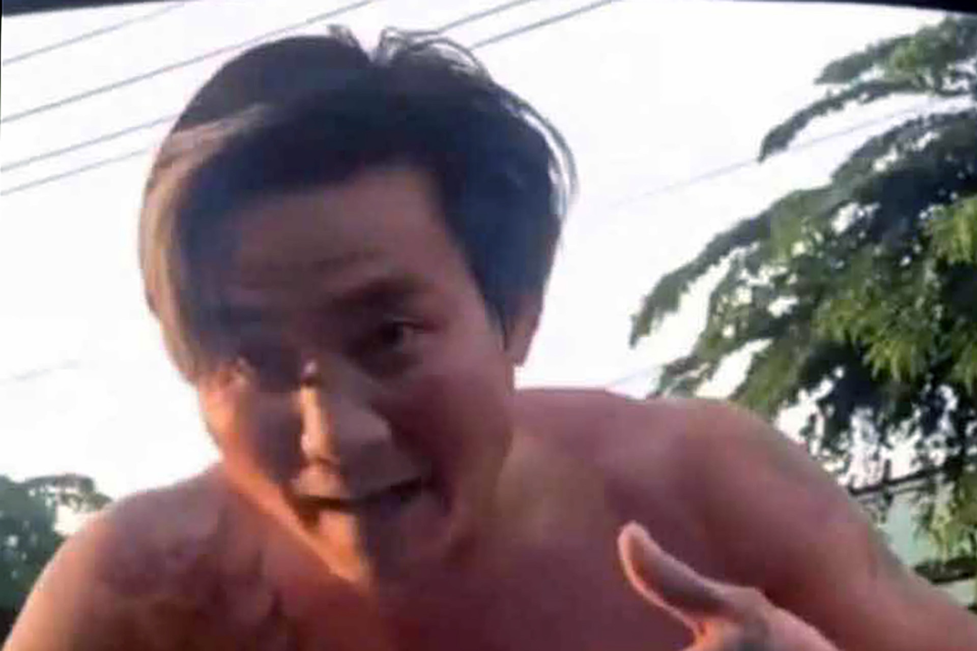 Chan oto giua duong thach thuc, nguoi dan ong o Binh Duong bi khoi to hinh anh