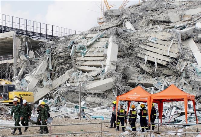 Dong dat tai Myanmar: Thai Lan dieu tra vu sap toa nha 30 tang hinh anh