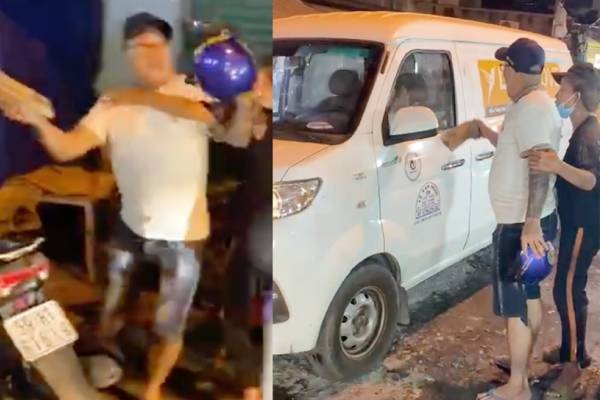 Bat giu nguoi di xe may chan dau oto, nhat gach da dap vo kinh hinh anh