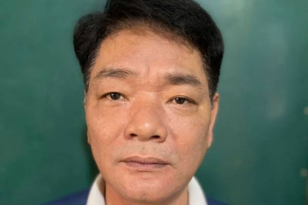 Khoi to doi tuong san xuat 200.000 doi tat gia Nike, Adidas hinh anh