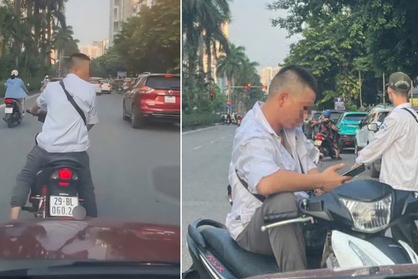 Nguoi dan ong chan oto doi tien giua pho Ha Noi: Cong an vao cuoc hinh anh