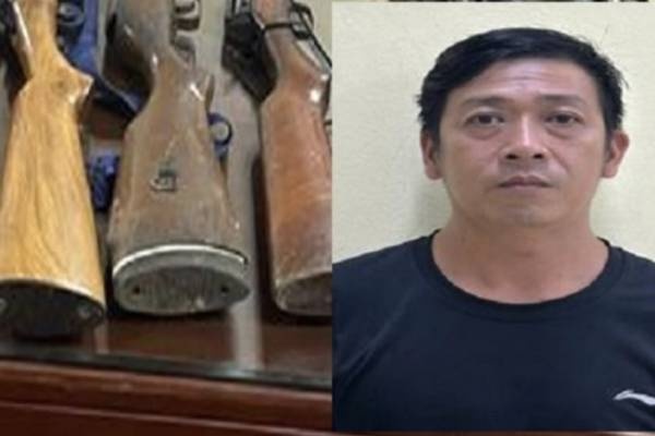 Bat doi tuong cat giau gan chuc khau sung quan dung trong nha hinh anh