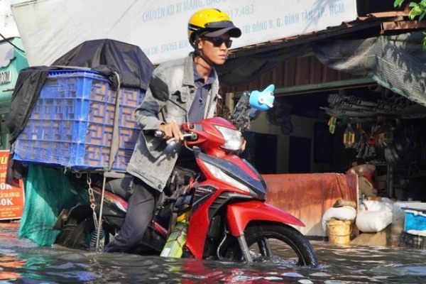 Toc do lun tai TP.HCM hien nay khoang 2-5 cm moi nam hinh anh