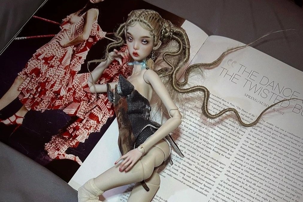 Thu may quan ao, lam dep cho bup be khop cau hinh anh