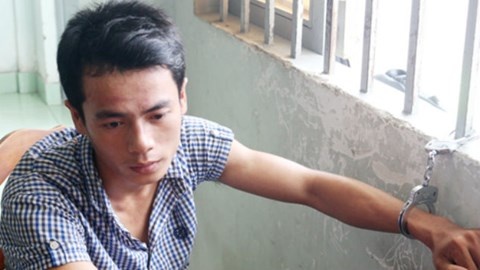 Đoàn Tấn Chung tại cơ quan công an.