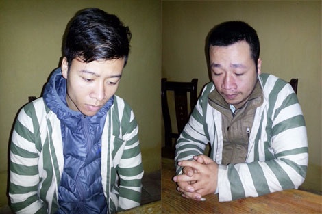 Hà Thọ Huy (trái) và Lê Huy tại cơ quan Công an.
