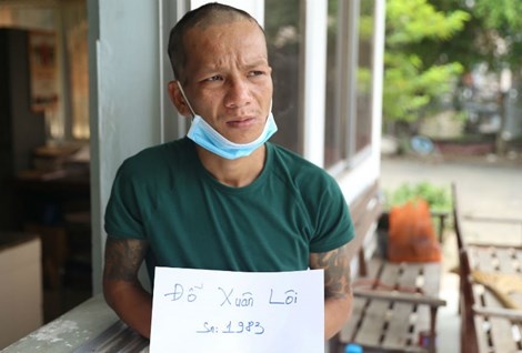 Nghi can Đỗ Xuân Lôi bị công an bắt giữ.