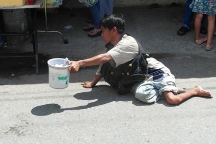 Nguoi lang thang xin an o Da Nang tang 300% hinh anh