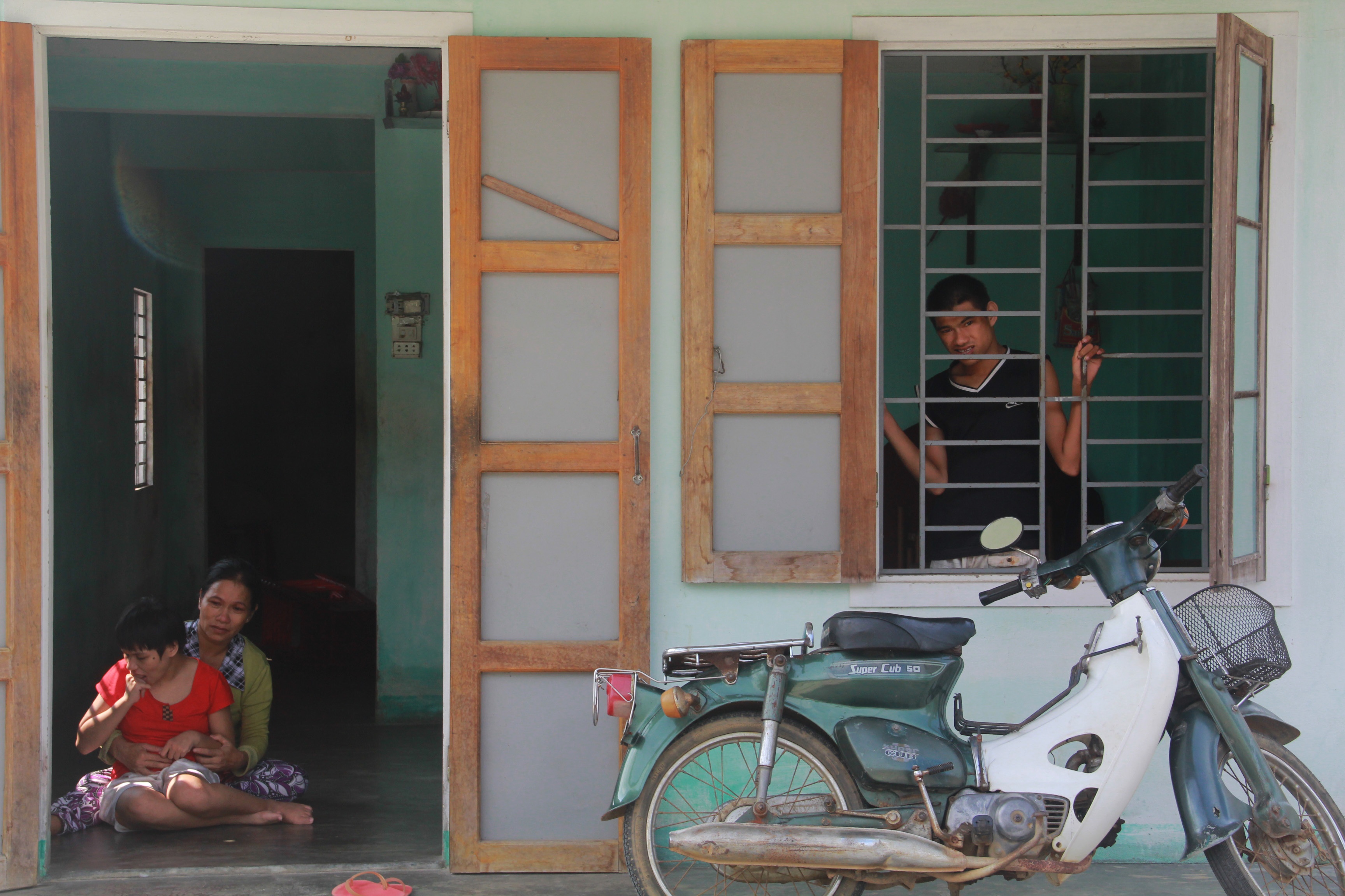 Nguoi me o Quang Nam nhot hai con tam than anh 1