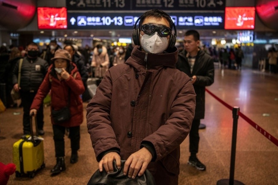 Cam to chuc tour den vung co nguy co nhiem virus Vu Han hinh anh