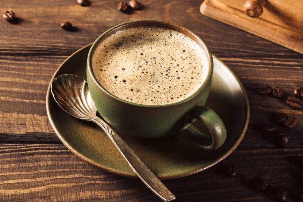 Vi sao ca phe khien nhieu nguoi muon di ve sinh? hinh anh