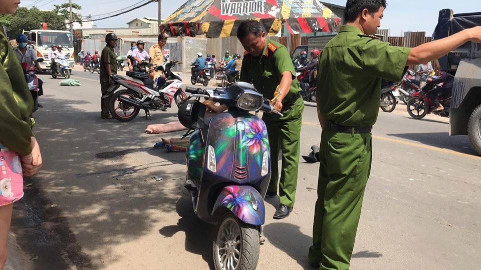 Va cham xe tai, mot co gai tu vong tren duong o Sai Gon hinh anh