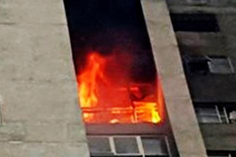 Chay chung cu o trung tam Sai Gon, cu dan hoang hot thao chay hinh anh