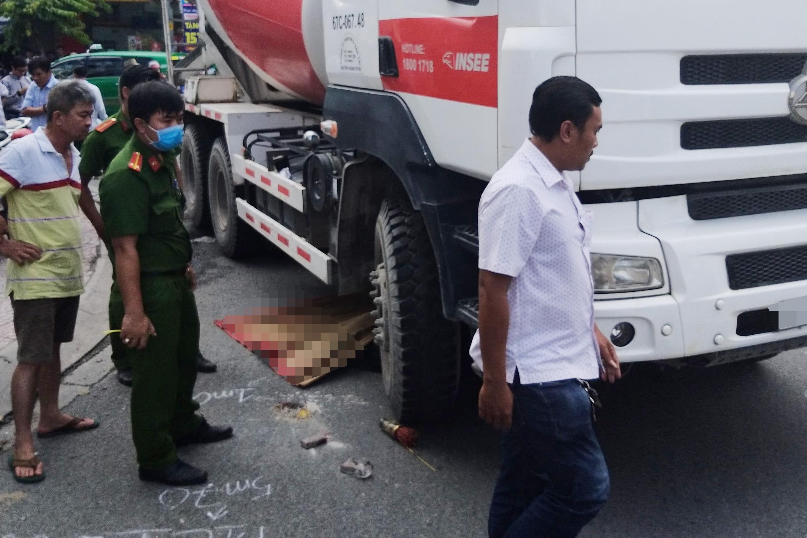 Mot phu nu thiet mang sau va cham voi xe bon o Sai Gon hinh anh