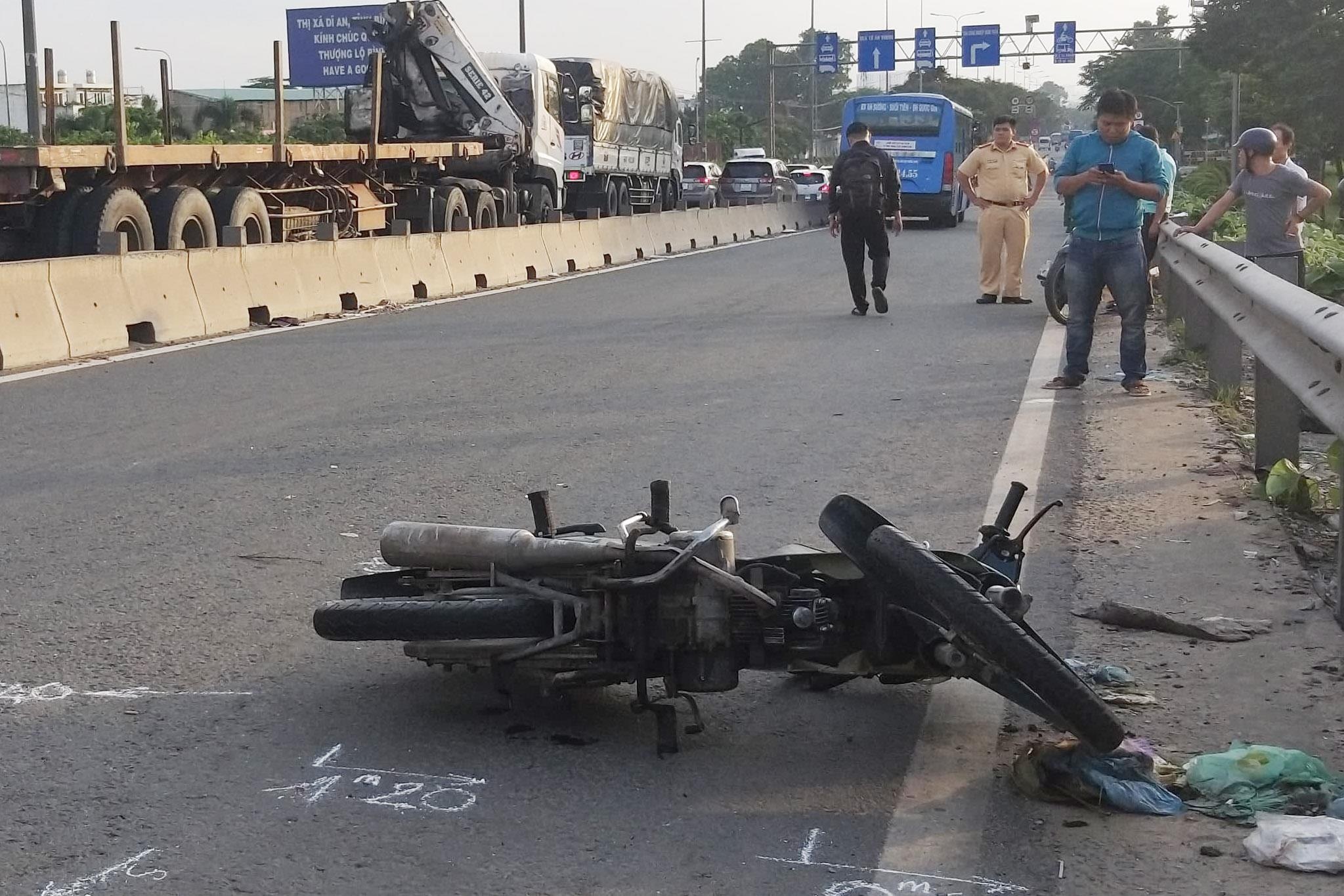 Quoc lo 1 un tac 3 km sau tai nan chet nguoi tren cau vuot Song Than hinh anh