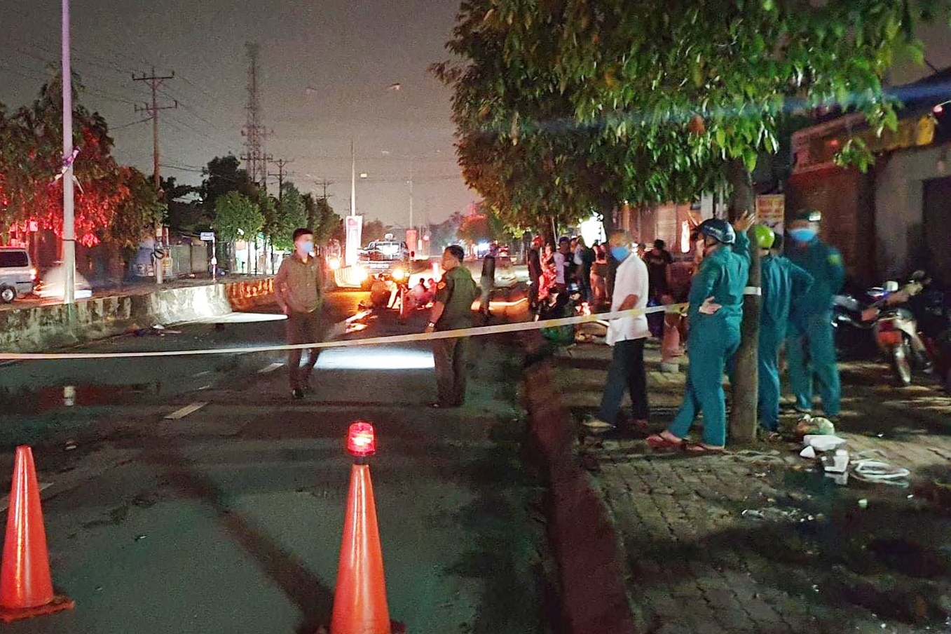 Doi nam nu tu vong o Binh Duong khi tong vao tru den duong hinh anh