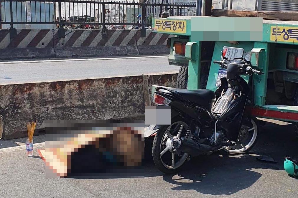 Nam thanh nien tu nan sau khi tong duoi xe dau keo o TP.HCM hinh anh