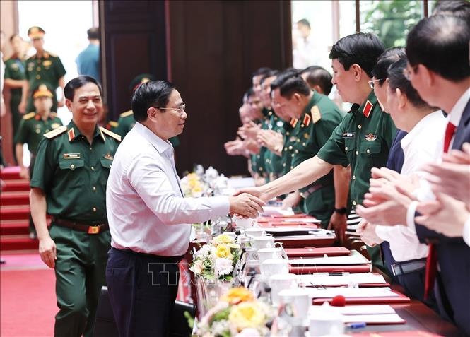 Thu tuong Pham Minh Chinh du Hoi nghi Quan chinh toan quan anh 2