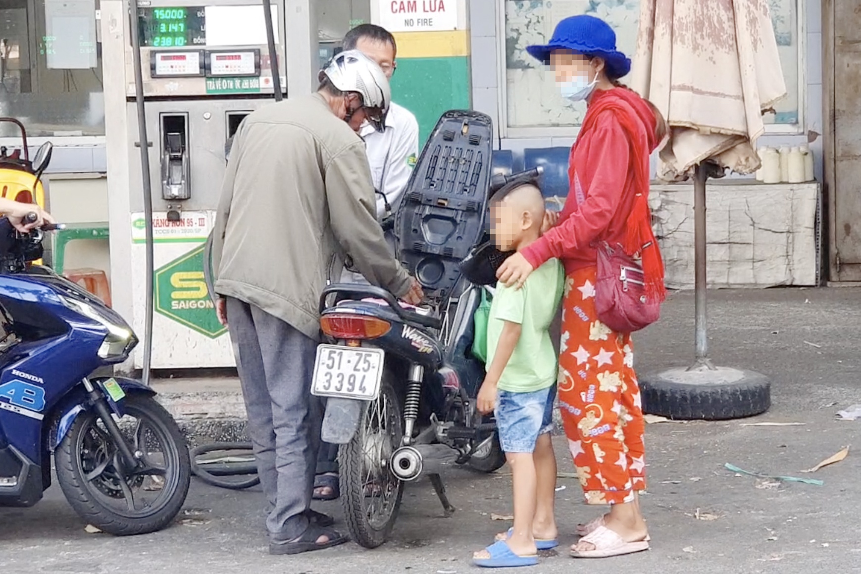 Nguoi an xin xuat hien nhieu tren duong pho TP.HCM hinh anh