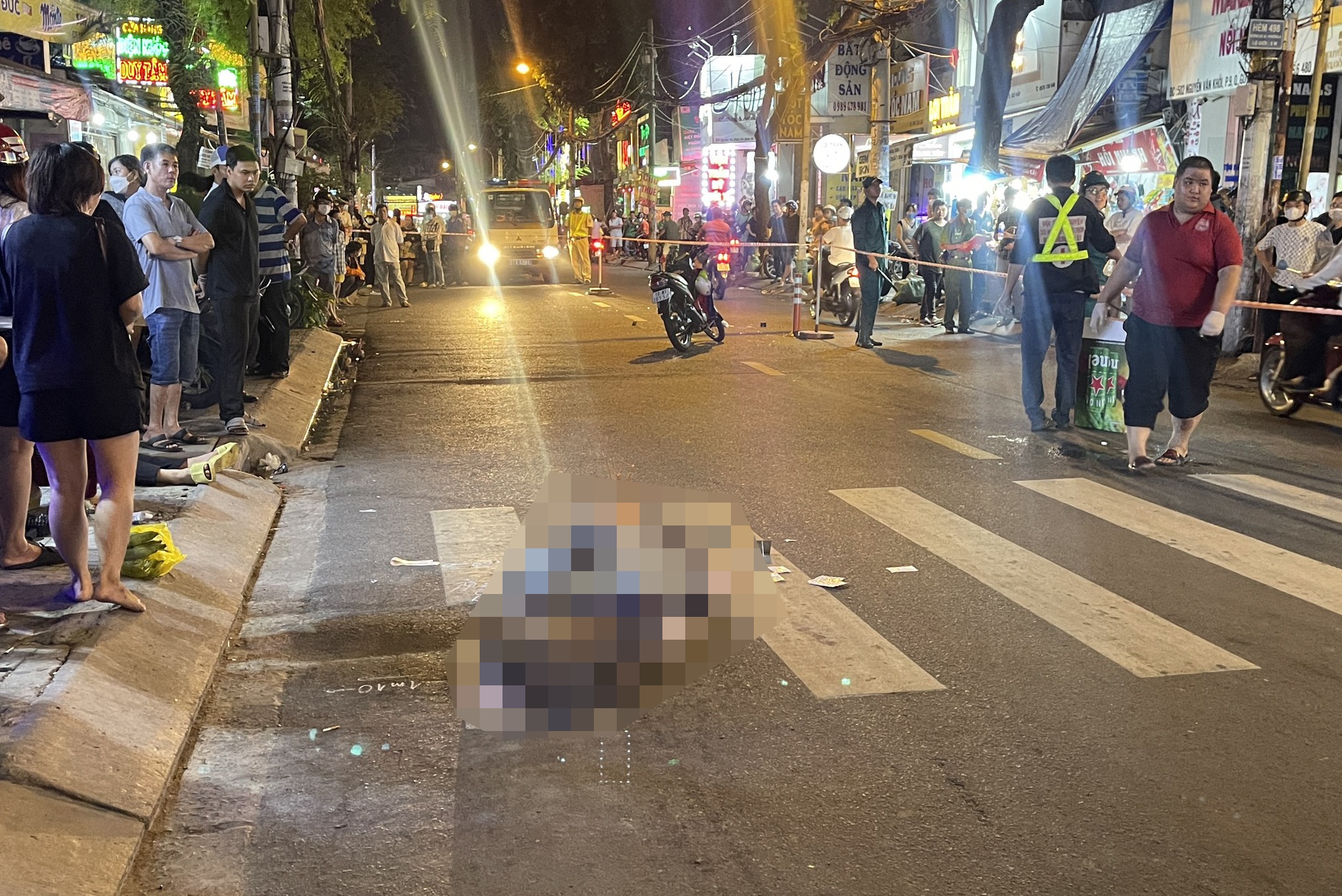 Nguoi dan ong tu vong sau va cham xe may o TP.HCM hinh anh