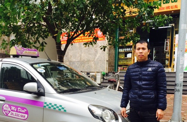 Lai xe taxi tra 14.000 USD cho khach anh 1