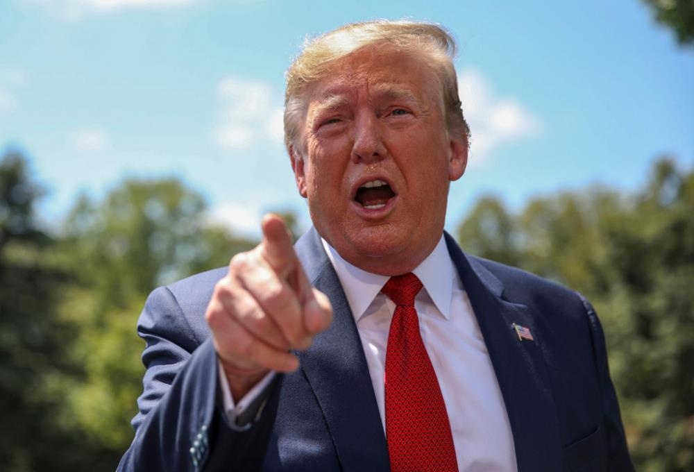 Ong Trump co quyen ra lenh cho cac cong ty My roi Trung Quoc khong? hinh anh